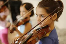 Boost Your Children's Academic Achievement Through Music Education